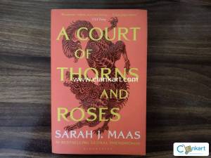 A Court Of Thorns And Roses by Sarah J. Maas
