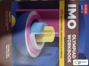 IMO Olympiad Workbook  Class 7 MTG