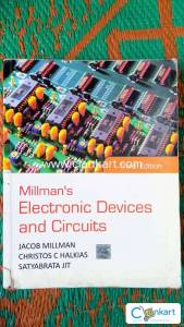 Millmans Electronic Devices And Circuits by Jacob Millman, Christos C