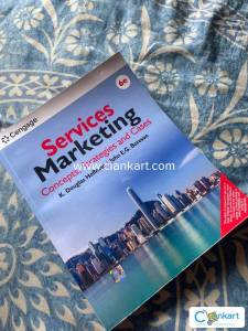Selling 2 brand-new, unused Services Marketing books  original copies