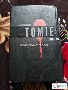 Tomie by junji ito . A horror japanese manga , one of the best seller